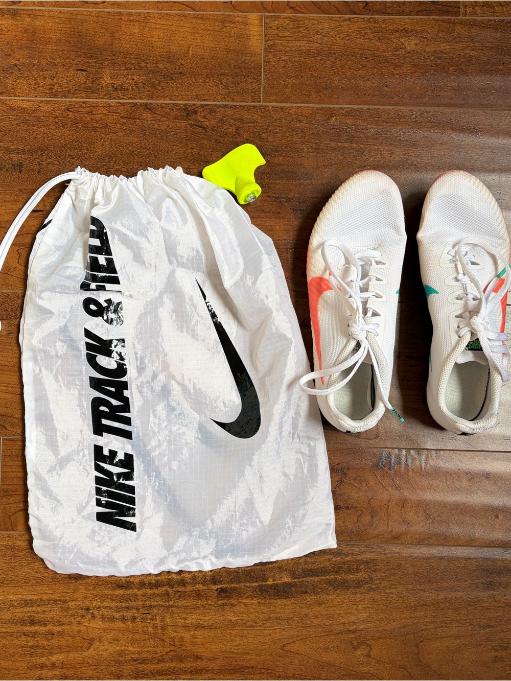 Nike Women’s White Track Spikes with Coral & Teal Accents